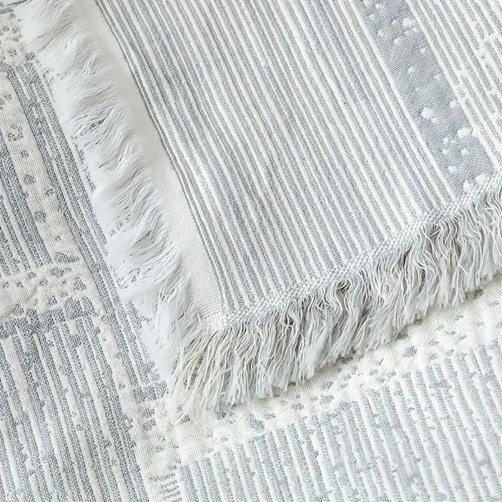 Gewebte Tagesdecke aus Baumwolle mit geometrischem Muster