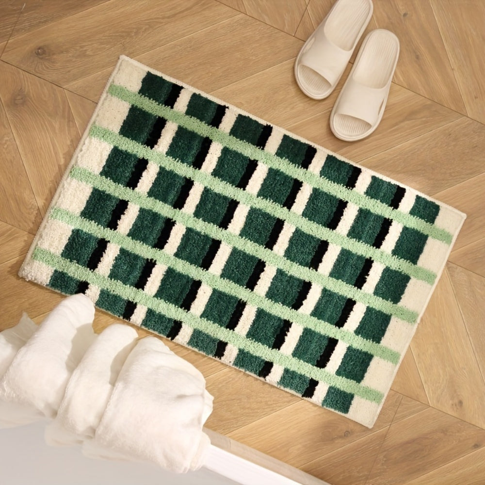 Geometrische Badematte in Moosgrün