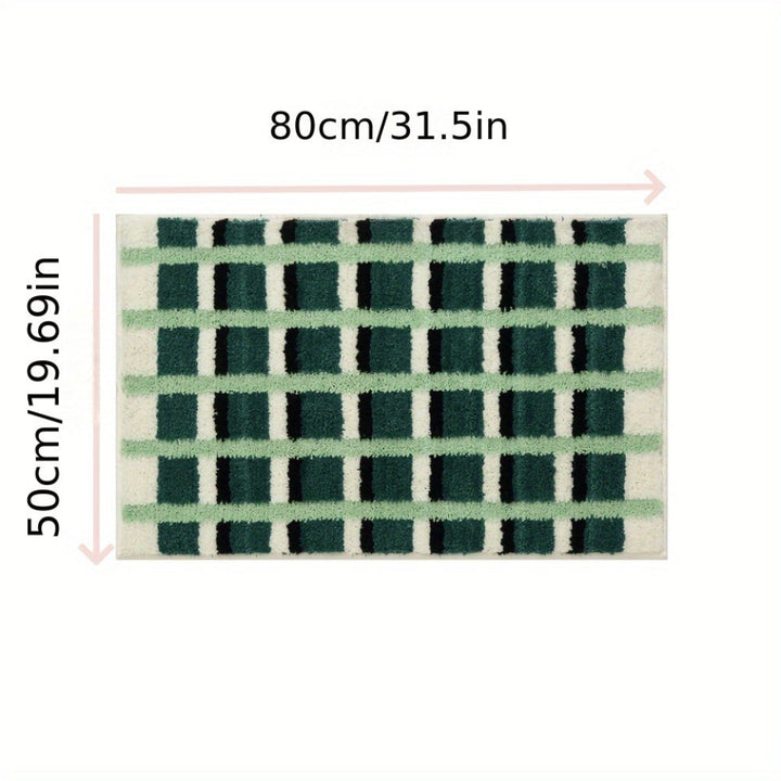 Geometrische Badematte in Moosgrün