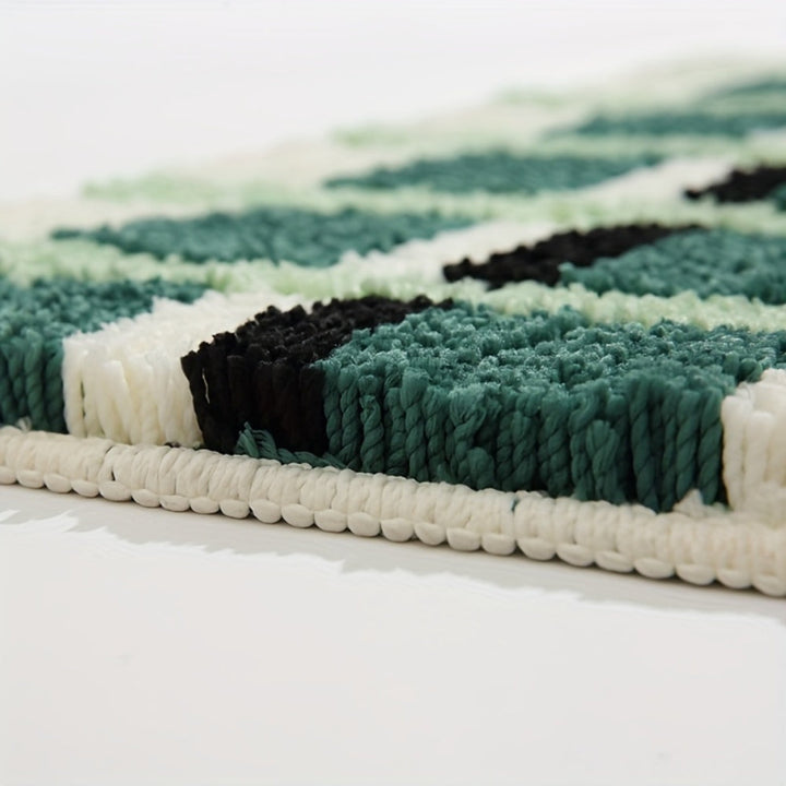 Geometrische Badematte in Moosgrün