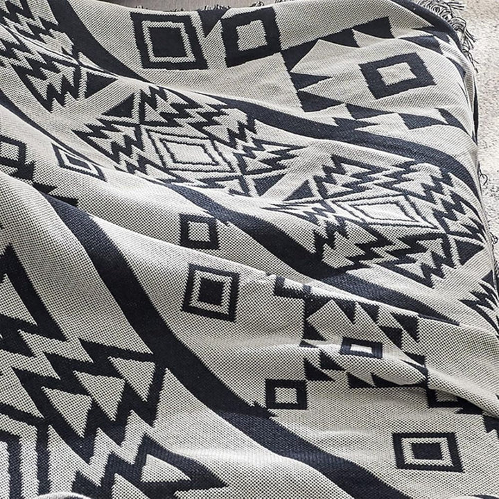 Wendbare Boho-Decke mit Labyrinthmuster