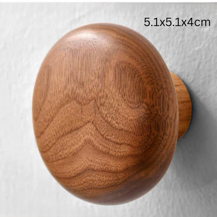 Holzhaken in Kieselsteinform
