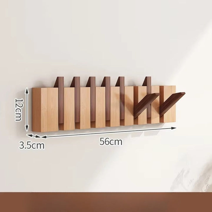 Klappbare Wandgarderobe in Klaviertasten-Optik