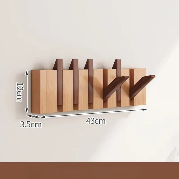 Klappbare Wandgarderobe in Klaviertasten-Optik