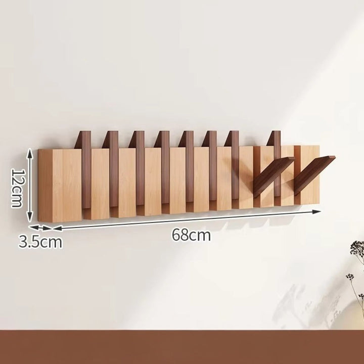 Klappbare Wandgarderobe in Klaviertasten-Optik
