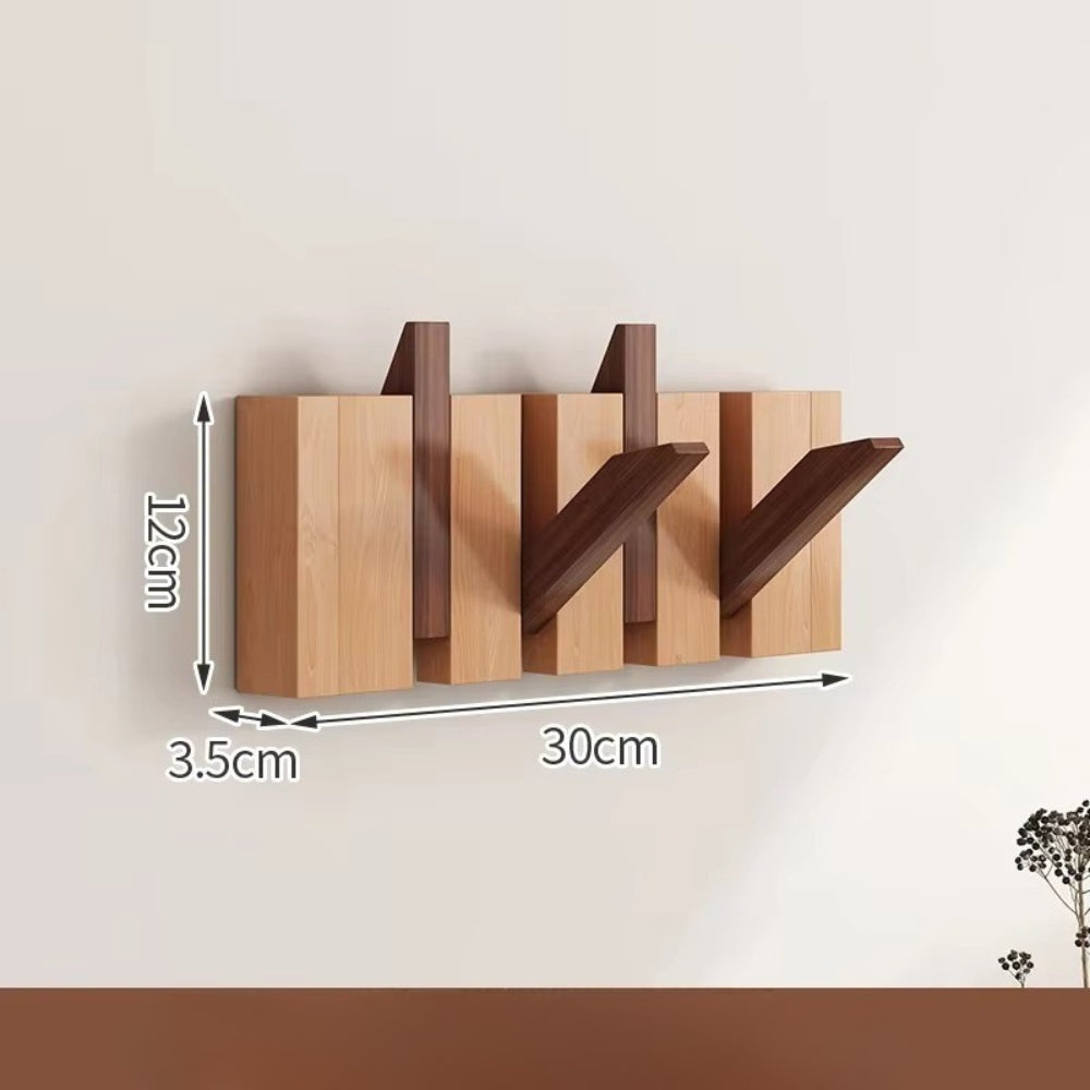 Klappbare Wandgarderobe in Klaviertasten-Optik
