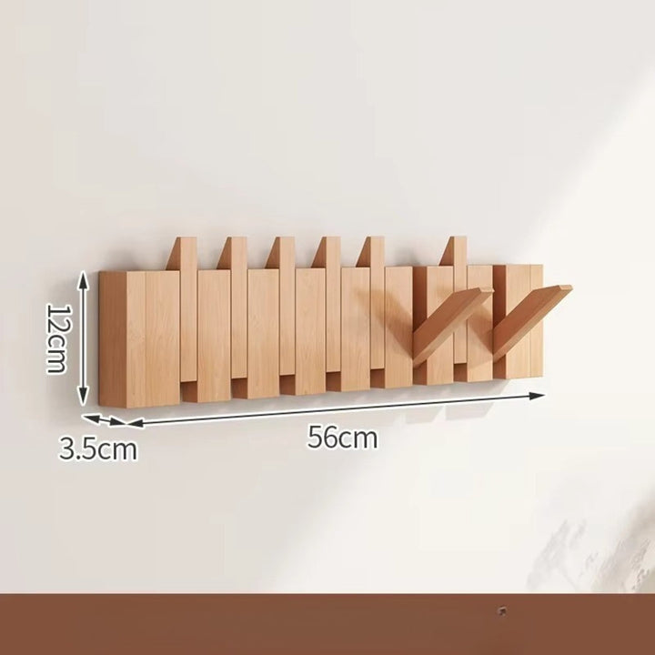 Klappbare Wandgarderobe in Klaviertasten-Optik