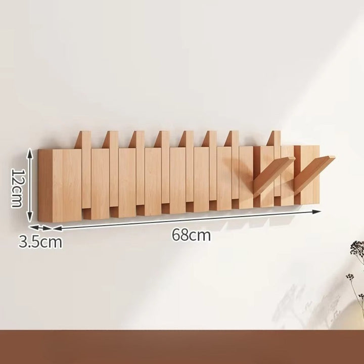 Klappbare Wandgarderobe in Klaviertasten-Optik