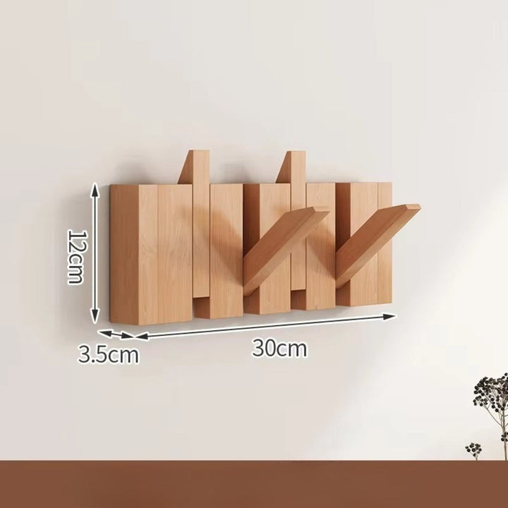 Klappbare Wandgarderobe in Klaviertasten-Optik