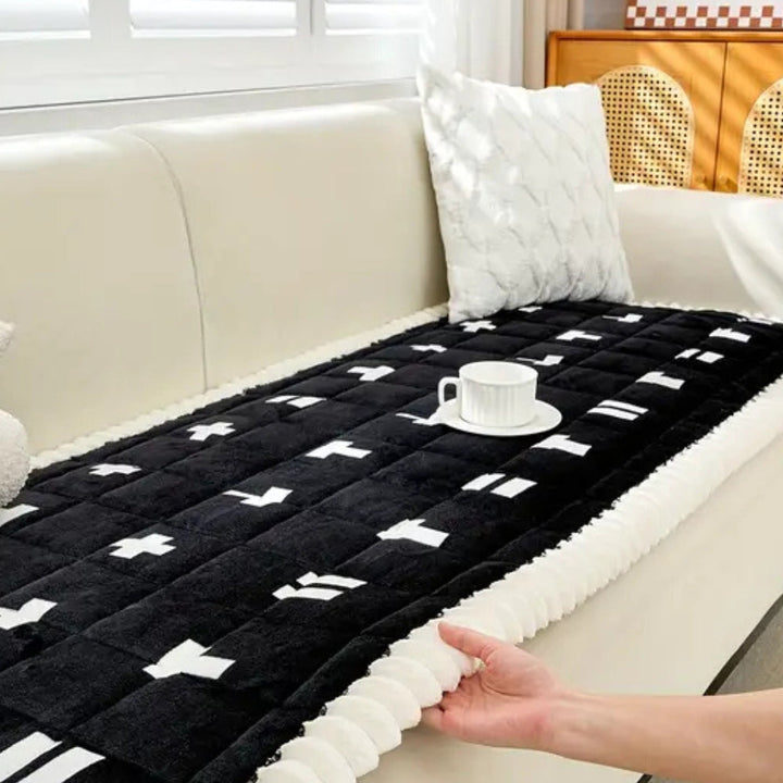 Gesteppter Sofaüberwurf mit Rüschenkante