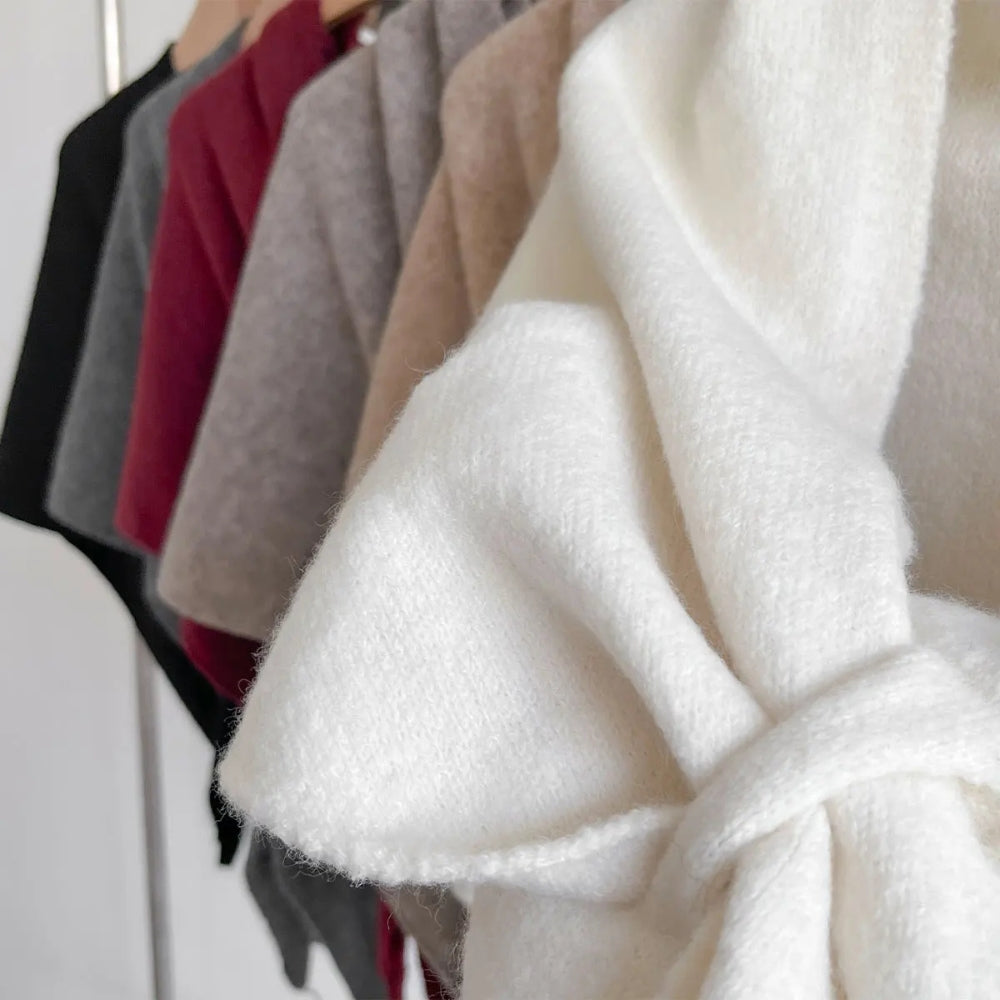 Dreieckiger Strickponcho