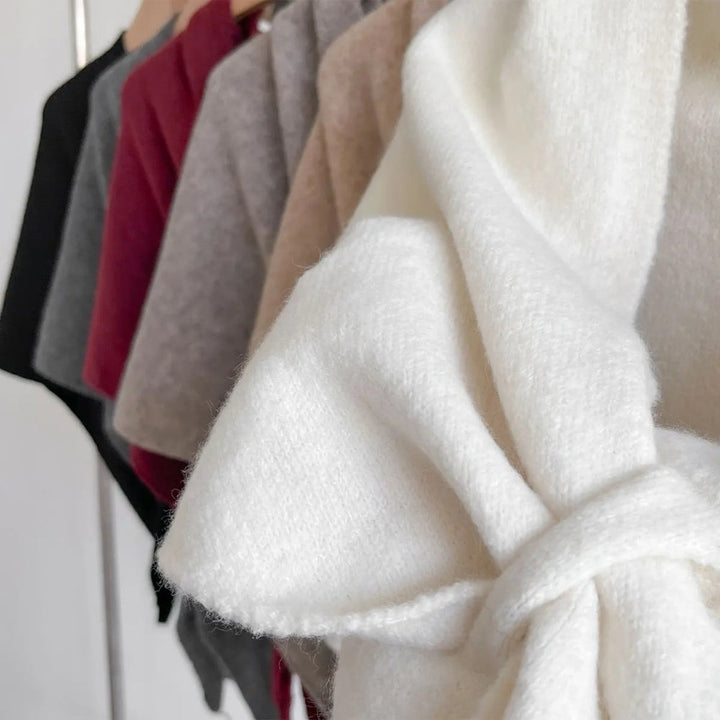 Dreieckiger Strickponcho