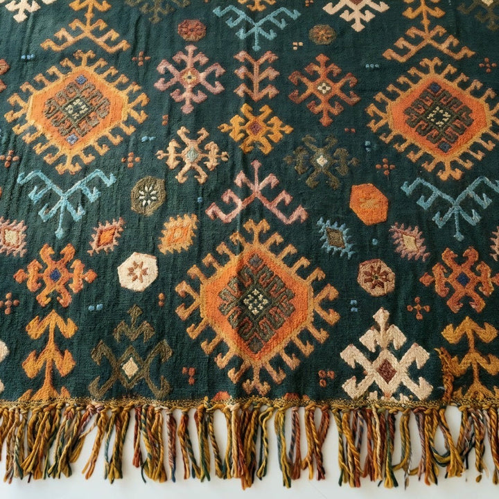 Ethno-Baumwolldecke mit geometrischem Muster und Fransen