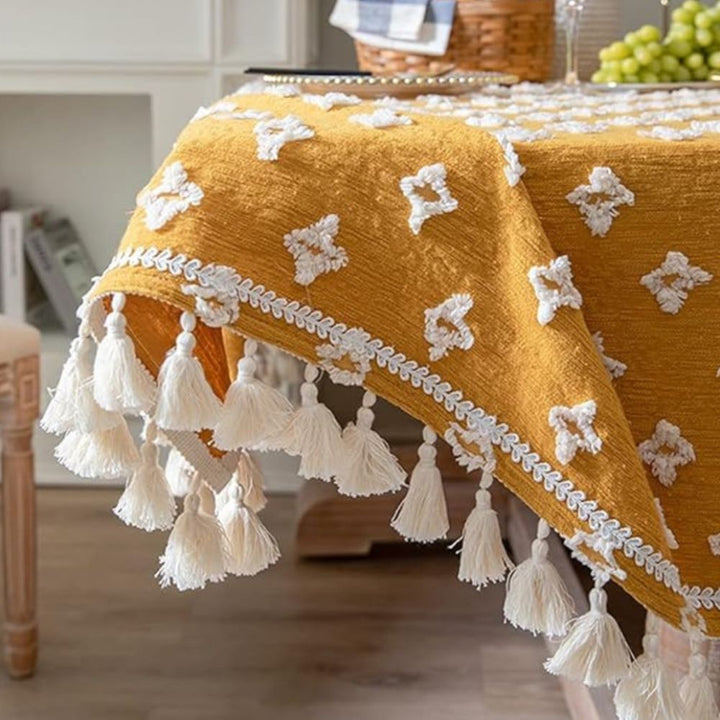 Gelbe bestickte Tischdecke mit Quasten