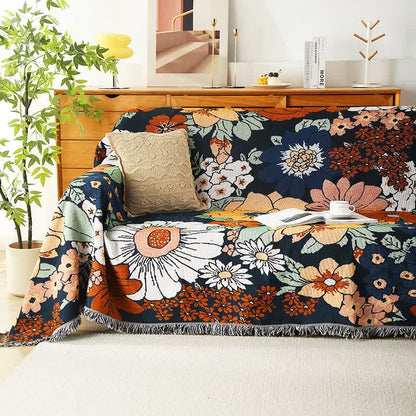 Sofadecke aus Baumwolle mit Blumenmuster und Quasten