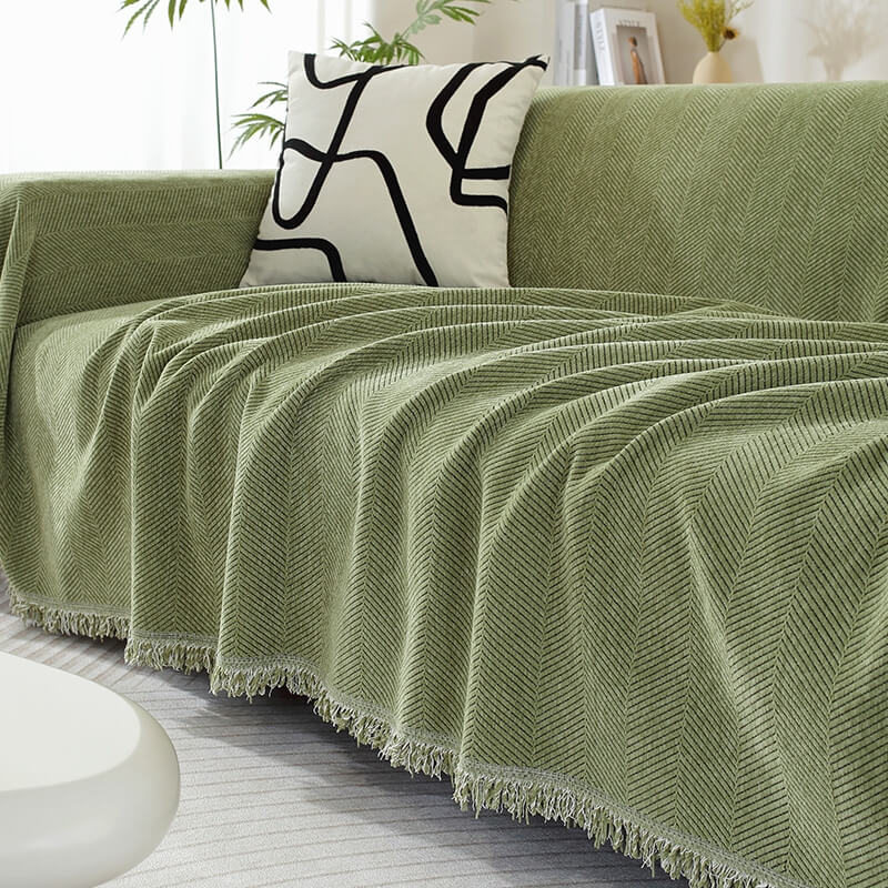 Chenille-Sofaüberwurf mit Fischgrätmuster und Fransen – Grün