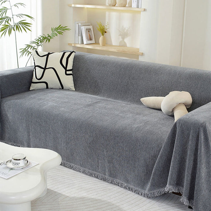 Chenille-Sofaüberwurf mit Fischgrätmuster und Fransen