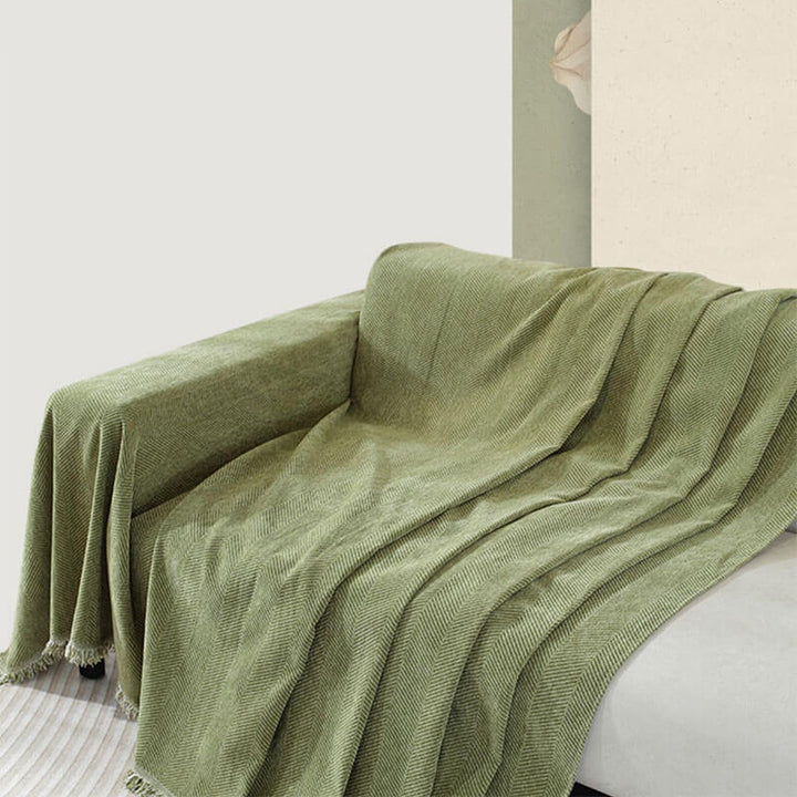Chenille-Sofaüberwurf mit Fischgrätmuster und Fransen