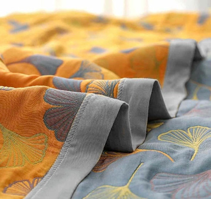 Wendbare Tagesdecke mit Ginkgoblättern